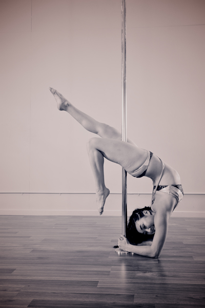Andrea James Lui pole trick elbow stand by Jessie May