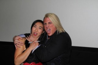 Andrea James Lui being strangled by wrester, Jaime Dauncey, at the Bounty Hunters premiere